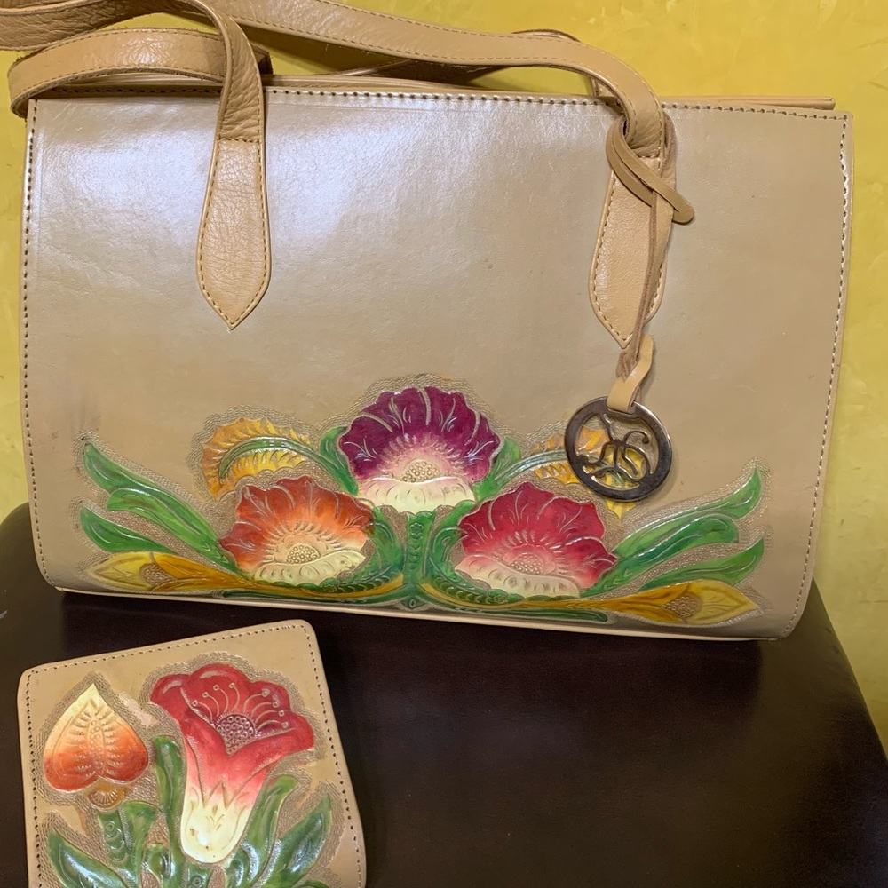 Hand tooled leather purse an wallet